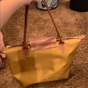Used mini Tan long champ bag